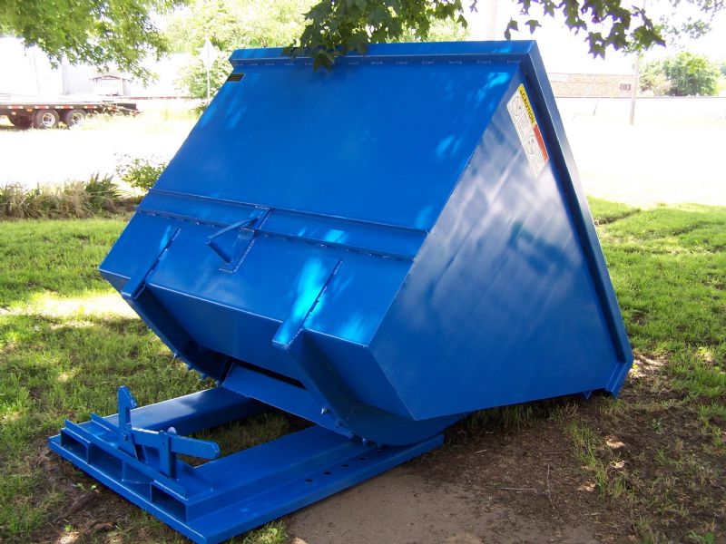 Front tilt dumpster features